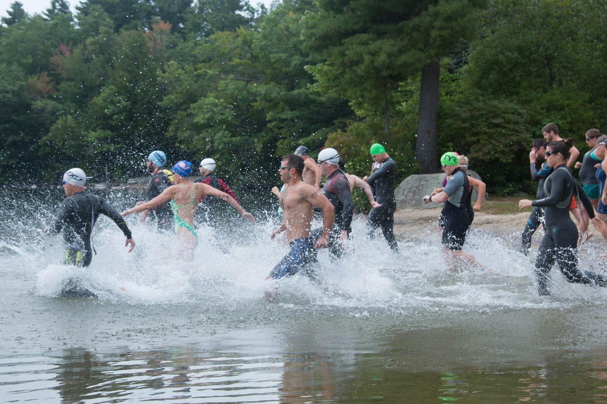 Hero Banner Image of racers running into water